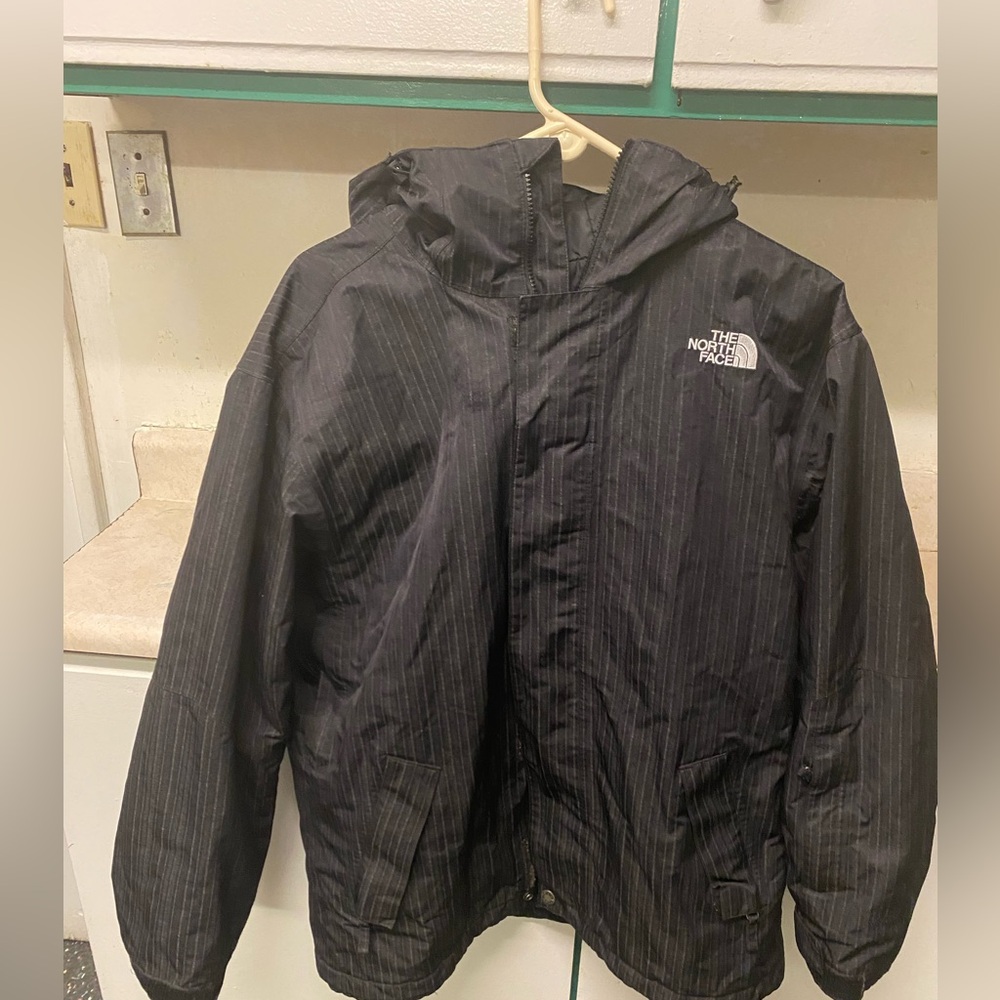 Men’s north face coat black with white stripes Sz med